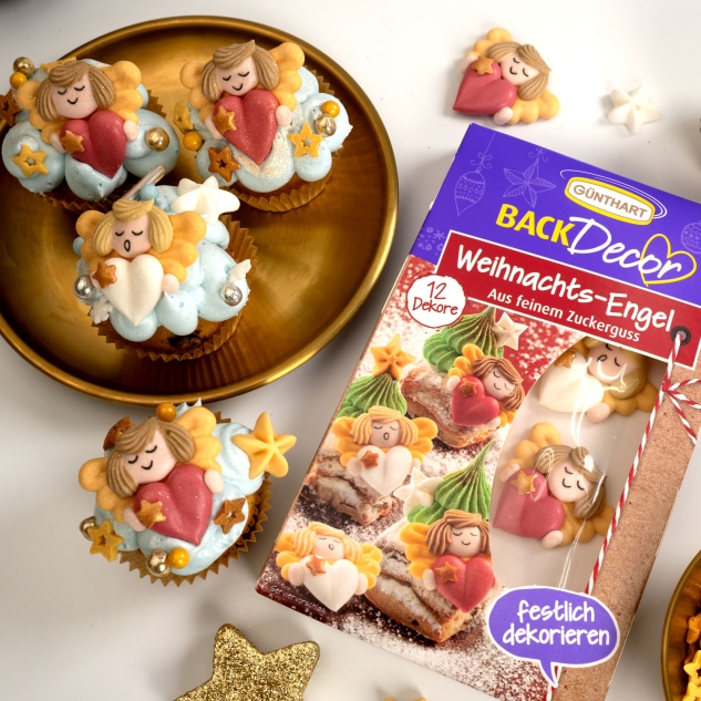 12 essabre Dekore als Weihnachtsengel in zwei Varianten und Sterne aus feinem Zuckerguß 