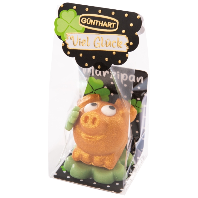 1 Stück Marzipan-Schweinchen gold auf Kleeblatt im Cellophanbeutel 